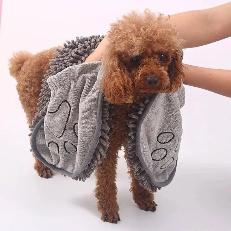 Soft fibre pet bath towel in blue, grey, purple, or red, measuring 62 cm by 23 cm.