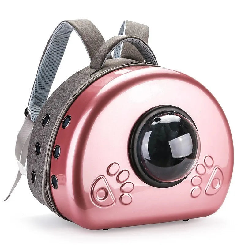 Transparent space capsule cat carrier in rose gold colour with hard-sided design
