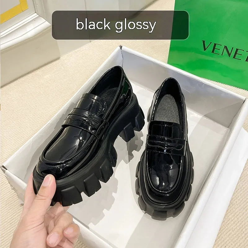 British style wide fit loafers in patent leather with rubber soles and shallow opening design