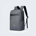 Graphite grey Oxford cloth business backpack with a USB charging port on the exterior.