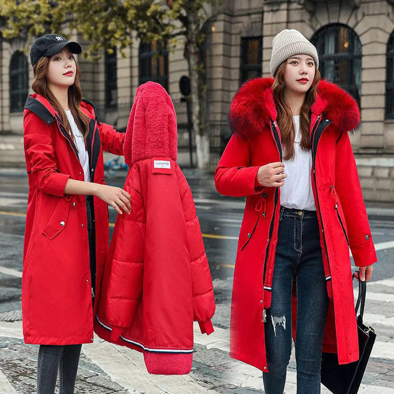 Women's white cotton-padded trench coat with two-way zip showing extended 100cm length and long sleeves