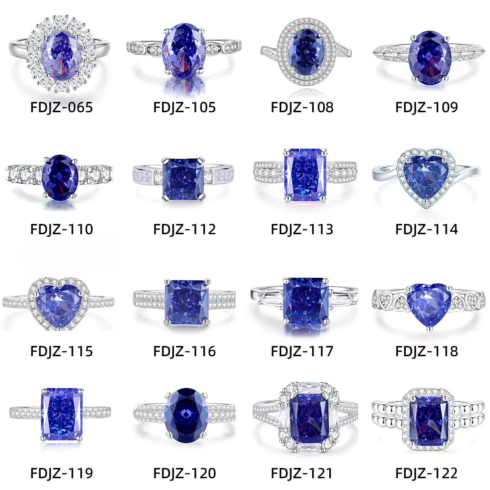 Heart-shaped 925 sterling silver ring with a sparkling ice flower cut colour zircon stone on a finger.