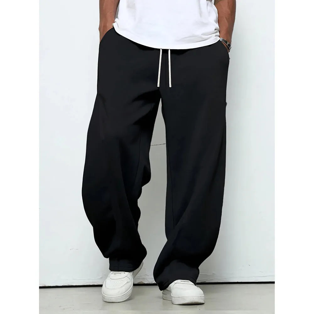 Men's straight-leg casual trousers in polyester fabric with drawstring waist in solid colour options