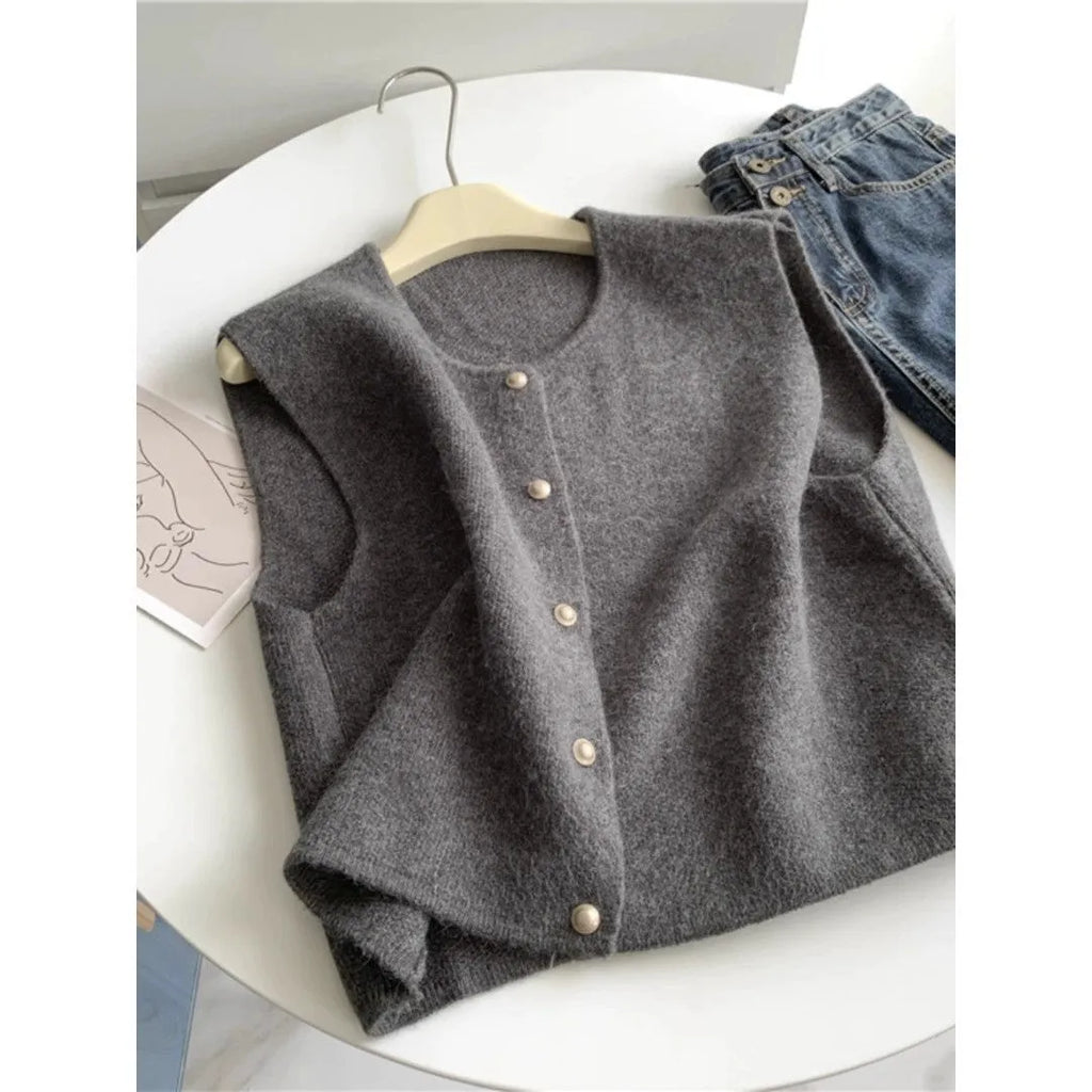 Women's casual polyester pullover in Angora red with half-length sleeves on a hanger.