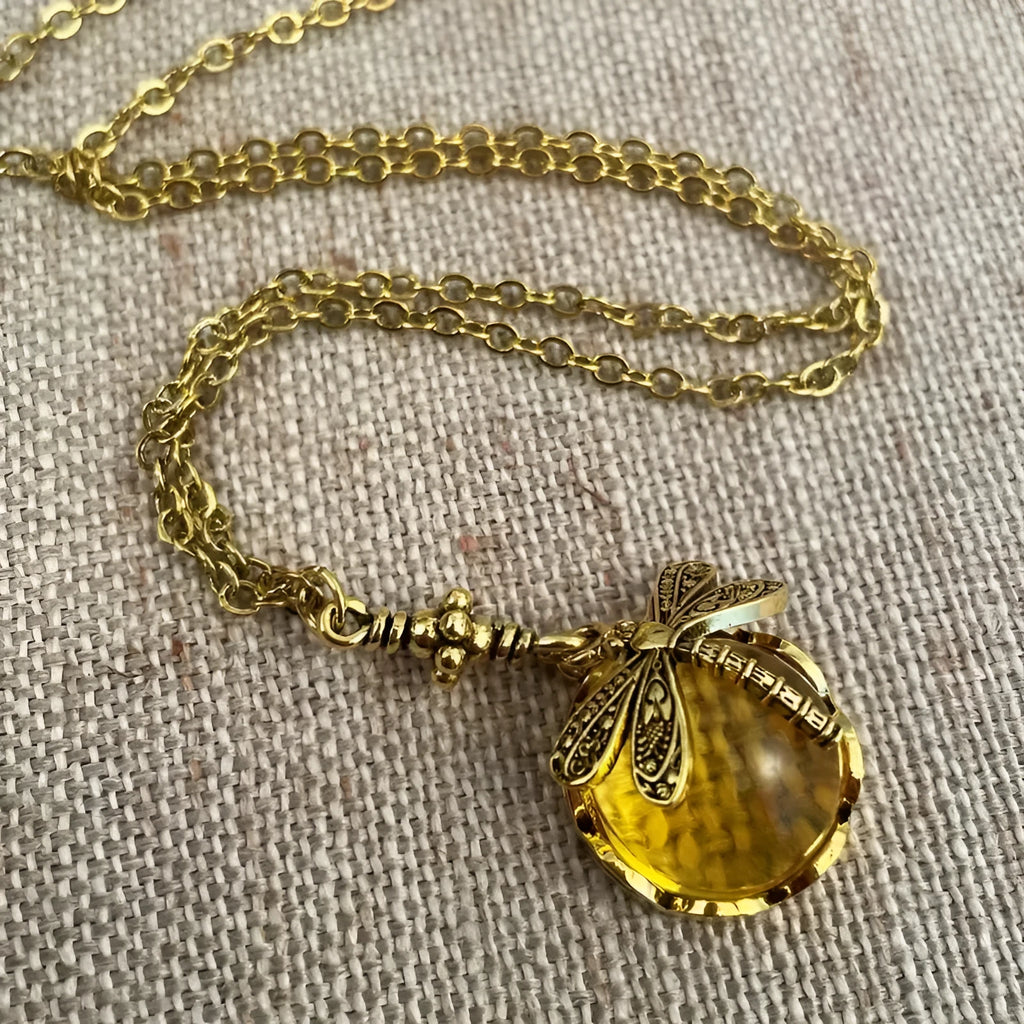 Hand carved dragonfly pendant necklace with vintage bronze appearance and 925 silver setting