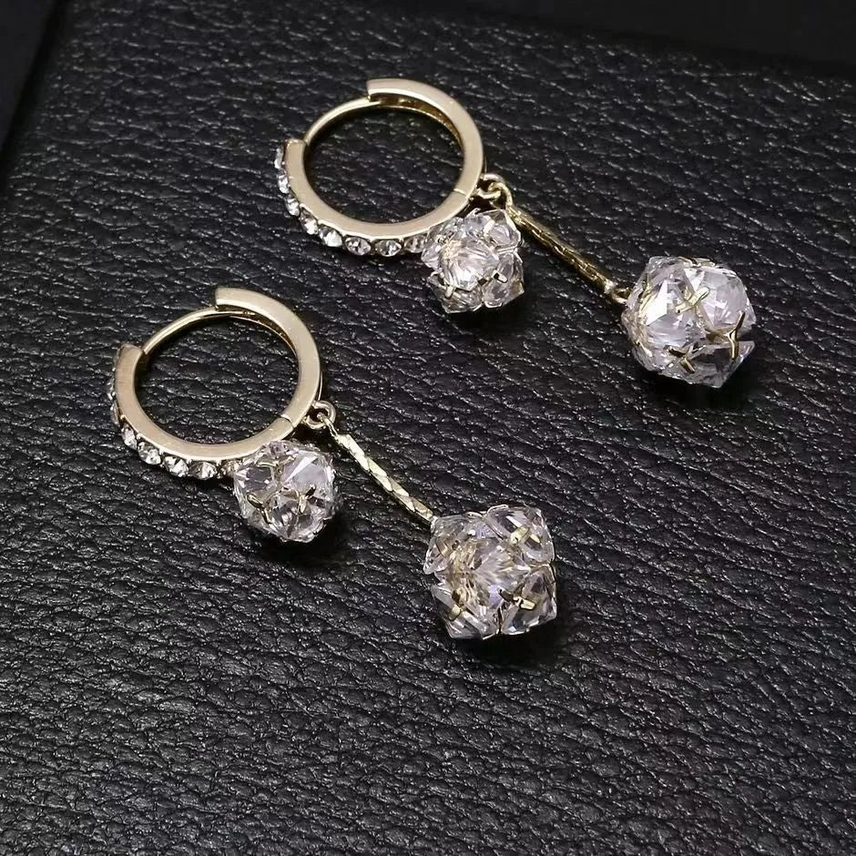Silver-colour women's clip-on earrings with a confession balloon design, rhinestone ball, and double tassel pendant.
