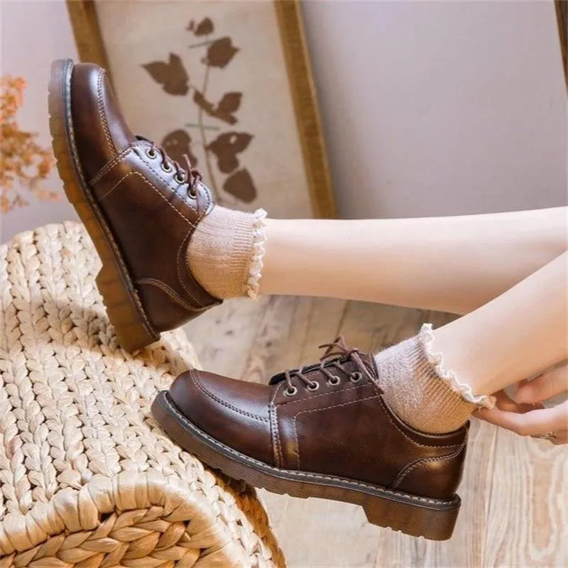 Women's black retro Mary Jane pumps shoes with low square heel and front lace-up design