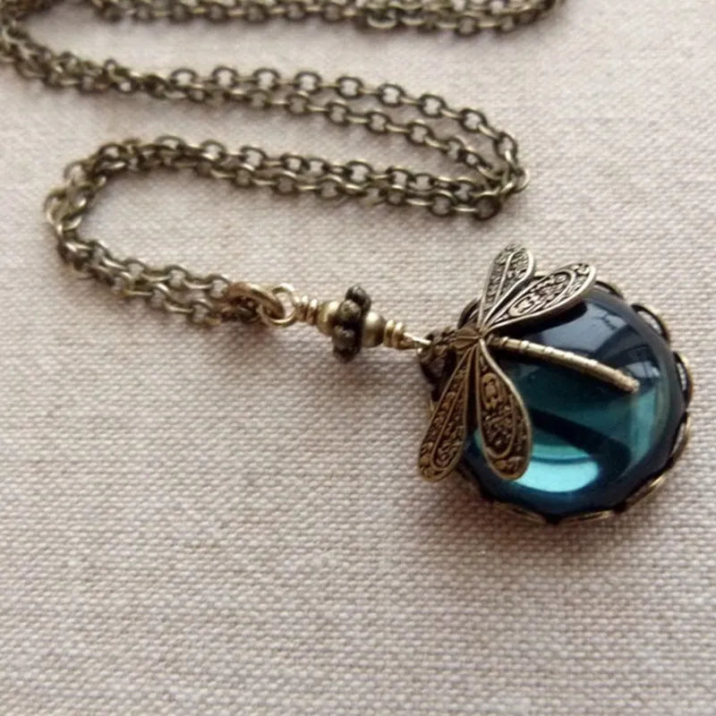 Hand carved dragonfly pendant necklace with vintage bronze appearance and 925 silver setting