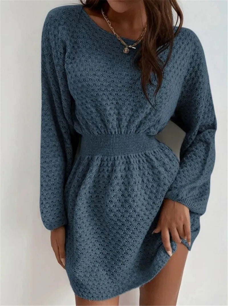 Blue polyester knitted dress with hand-crocheted flowers, fitted waist, and long sleeves