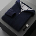 Man wearing a dark blue zip-front cashmere cardigan with a half-high collar and loose fit.