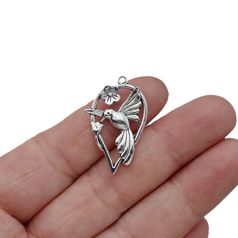 Alloy magpie bird pendant with electroplated finish in P234 colour for DIY jewellery making.