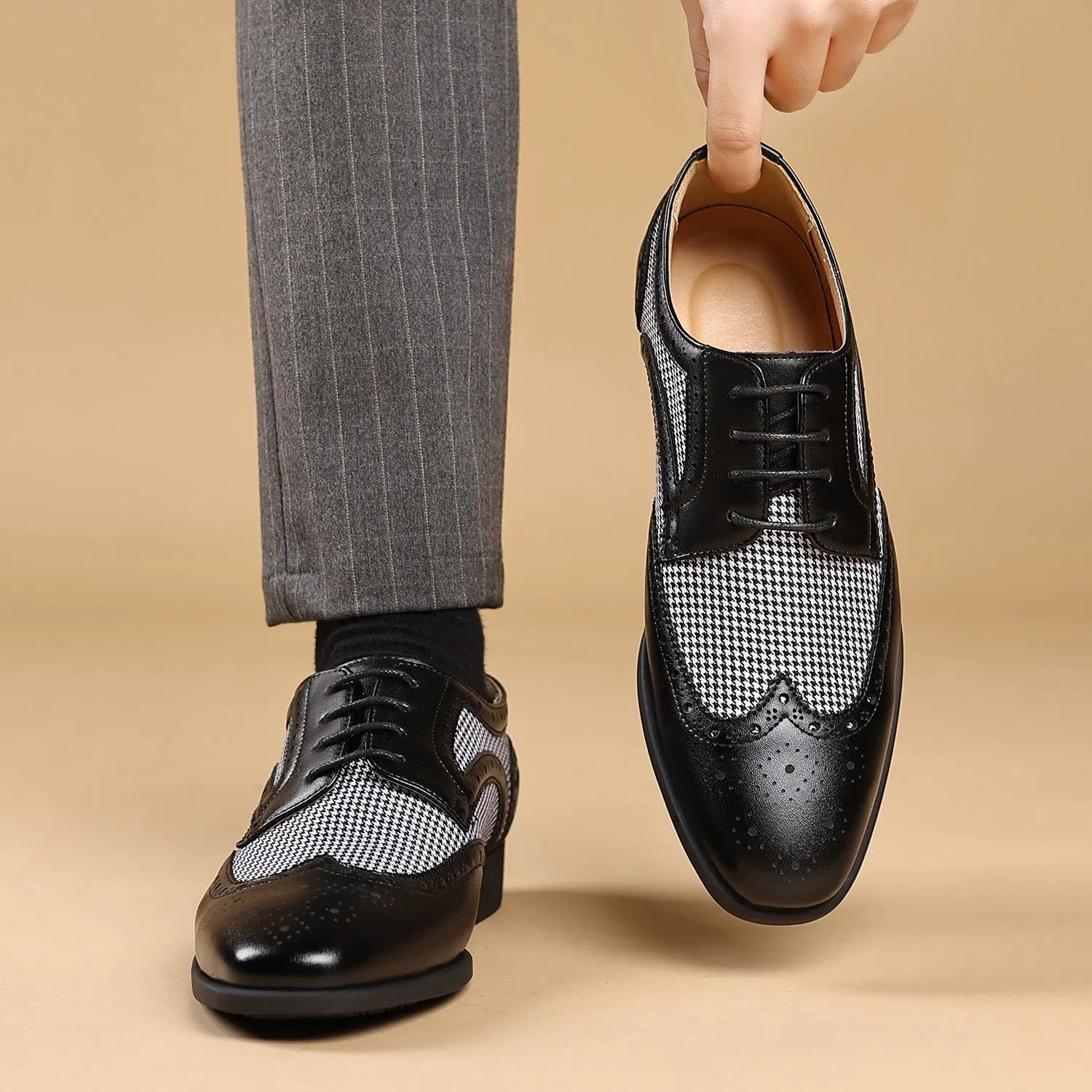 Men's black houndstooth plaid casual shoes with square toe and lace-up front on a rubber sole.