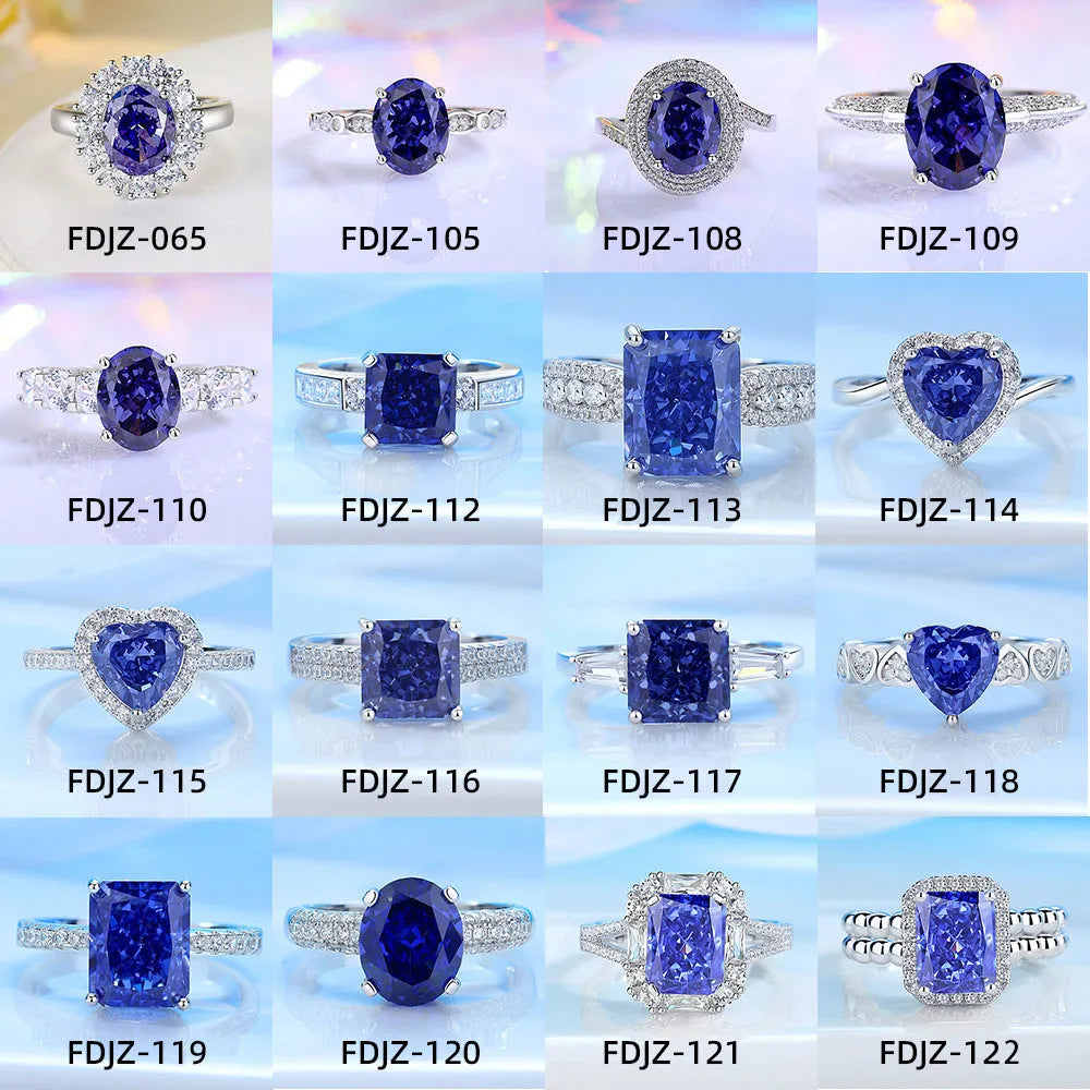 Heart-shaped 925 sterling silver ring with a sparkling ice flower cut colour zircon stone on a finger.