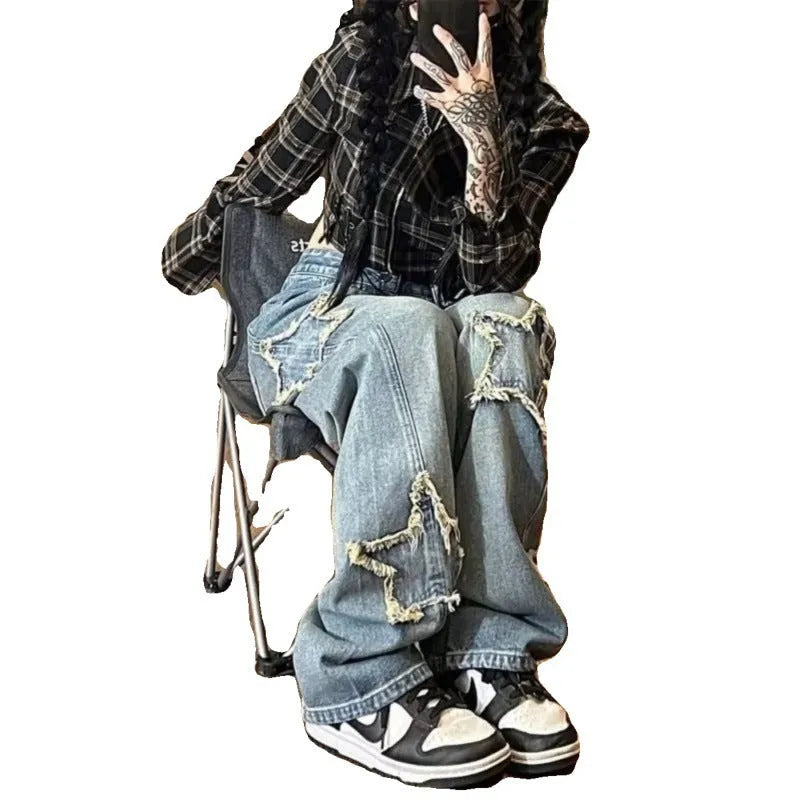 Blue women's high-waist straight-leg jeans on a neutral background.