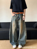 Men's retro blue distressed denim jeans with a wide-leg slim fit and micro elasticity.