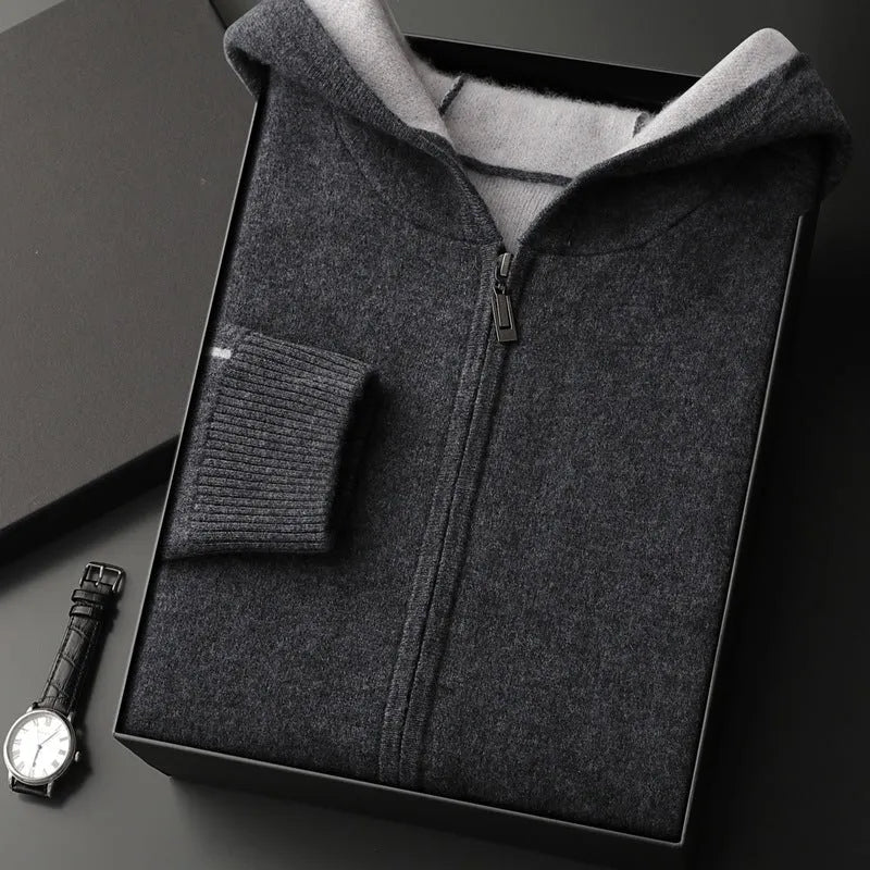 Man wearing a dark blue zip-front cashmere cardigan with a half-high collar and loose fit.