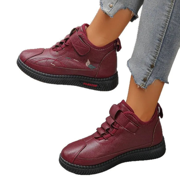 Women's black velvet cotton shoes with non-slip rubber soles showing low tube sock design