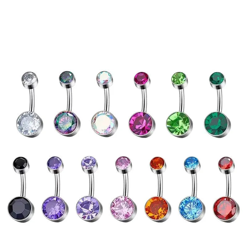 Double-headed titanium alloy navel stud with zirconium accents in various colours on a plain background.