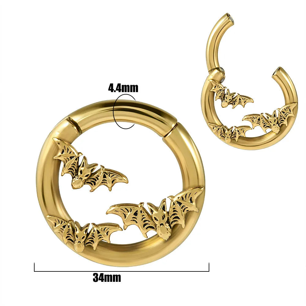 Fashion stainless steel earrings with a shaped totem pattern in an electroplated colour finish.