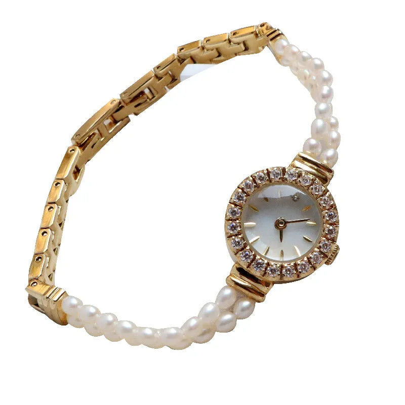 Women's light gold bracelet watch with natural freshwater pearls and 18mm round dial