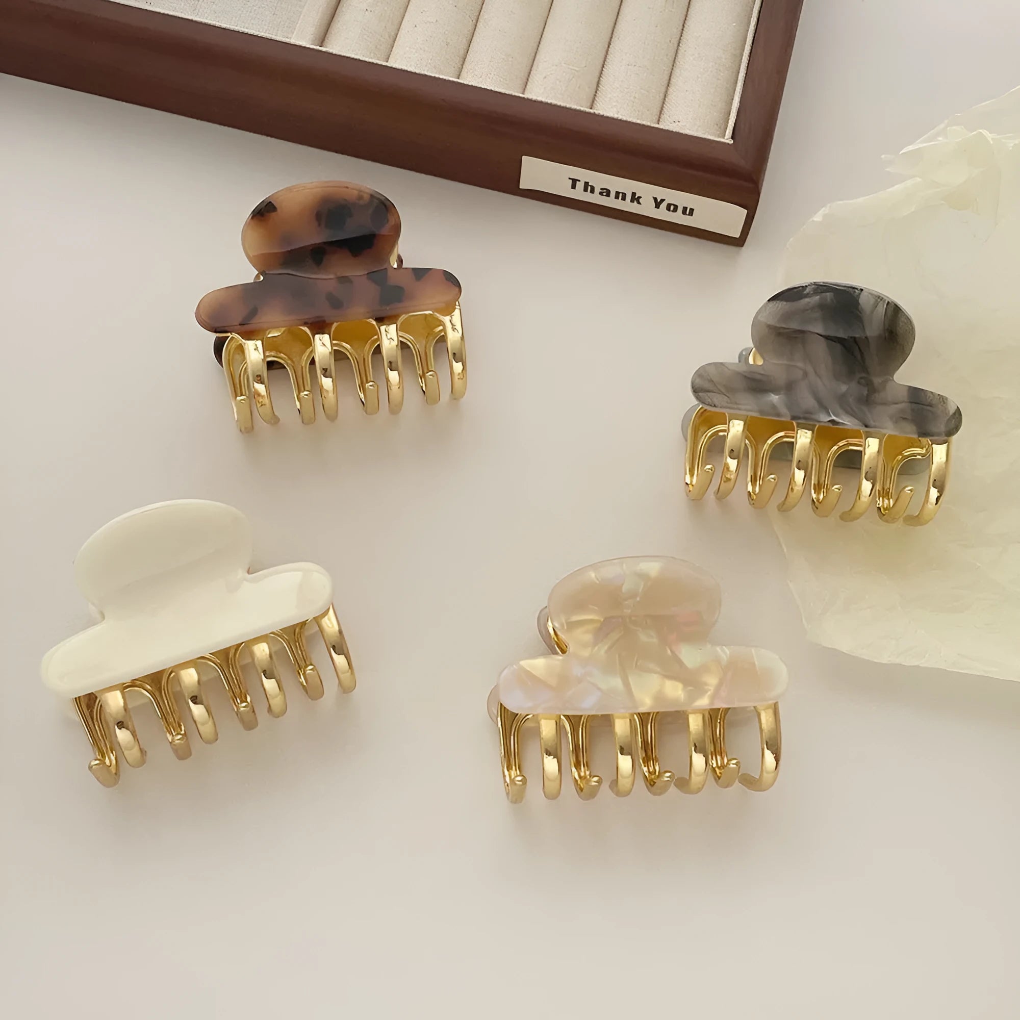 Dopamine retro acetate hair barrette with a metal grip in a medium size, shown in beige colour.
