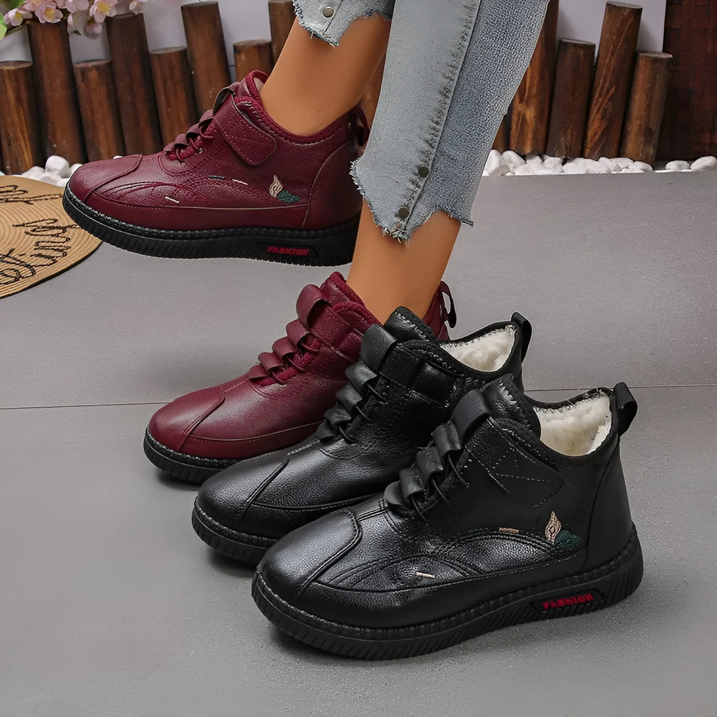 Women's black velvet cotton shoes with non-slip rubber soles showing low tube sock design