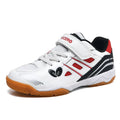 White and blue lightweight badminton shoes with ribbed sole and low-top PVC upper.
