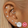 Geometric petal diamond stud earrings in platinum-colour sterling silver with ear clip fastening