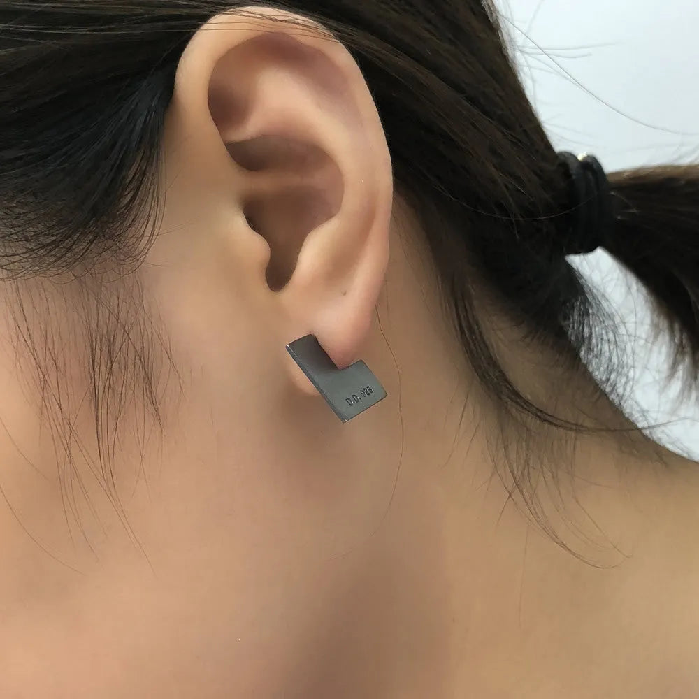 Oxidised black geometry square sterling silver earrings showing minimalist design and 16mm size