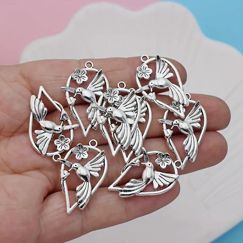 Alloy magpie bird pendant with electroplated finish in P234 colour for DIY jewellery making.