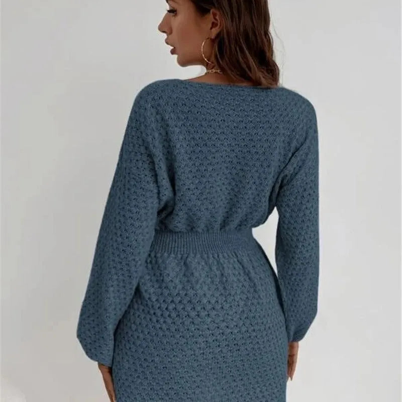 Blue polyester knitted dress with hand-crocheted flowers, fitted waist, and long sleeves