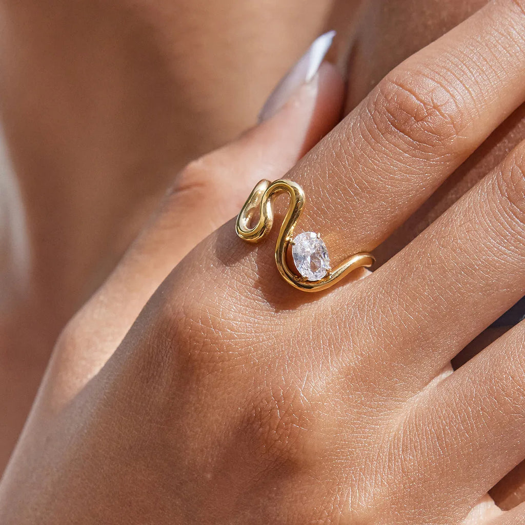 Geometric titanium steel ring with zircon stones in a silver-tone finish.