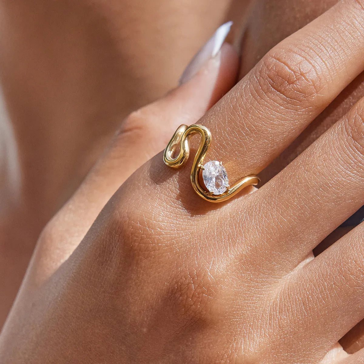 Geometric titanium steel ring with zircon stones in a silver-tone finish.