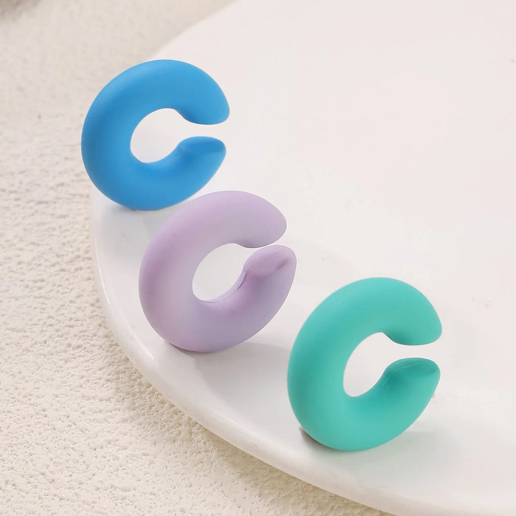 CCB material non-piercing ear clips in geometric C-shape with matte candy colours