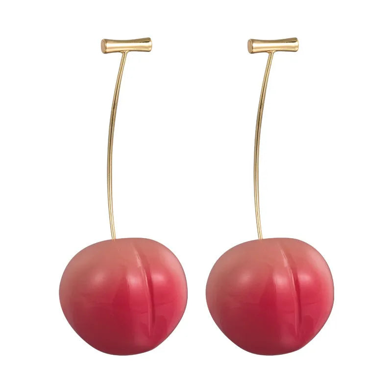 Small and large acrylic peach fruit earrings with copper hooks showing realistic peach detailing
