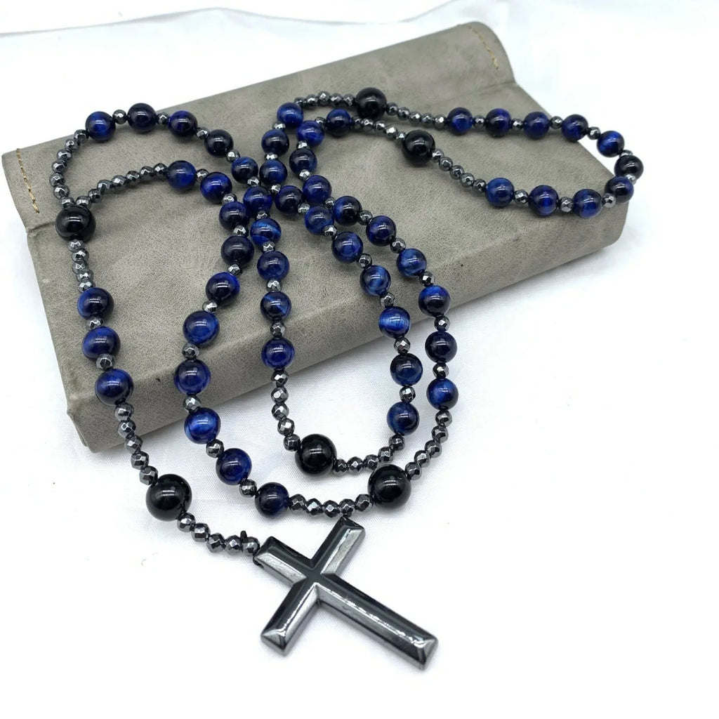 Men's hand-woven stone cross pendant necklace on a ball bead chain with safety lock clasp.