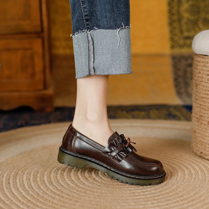British style women's round head leather shoes with a chunky flat heel in black or brown.