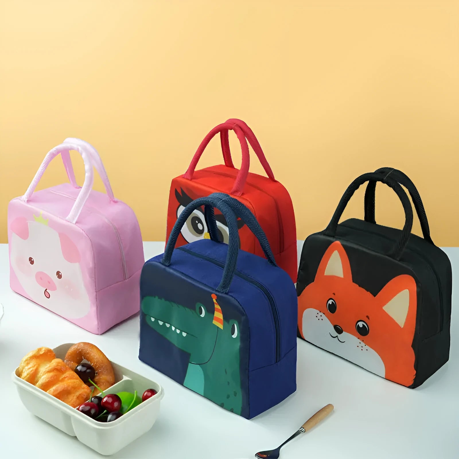 Cartoon insulated lunch bag in Oxford cloth with aluminium foil lining for heat preservation.