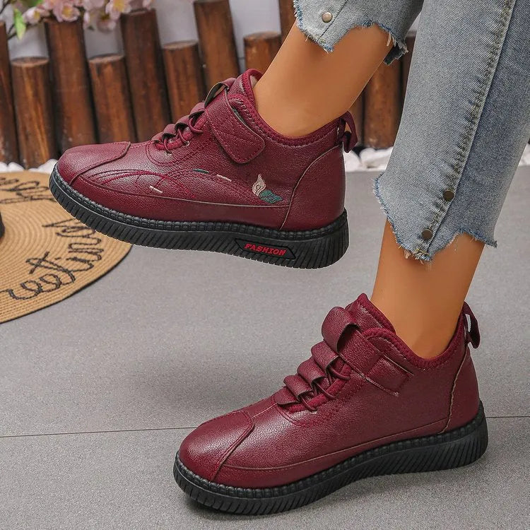 Women's black velvet cotton shoes with non-slip rubber soles showing low tube sock design