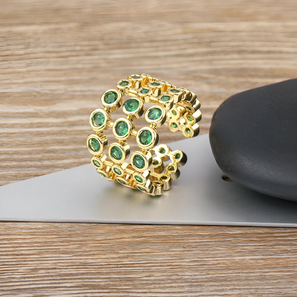 Copper ring with 18K gold plating and green zircon on exaggerated wide three-layer band