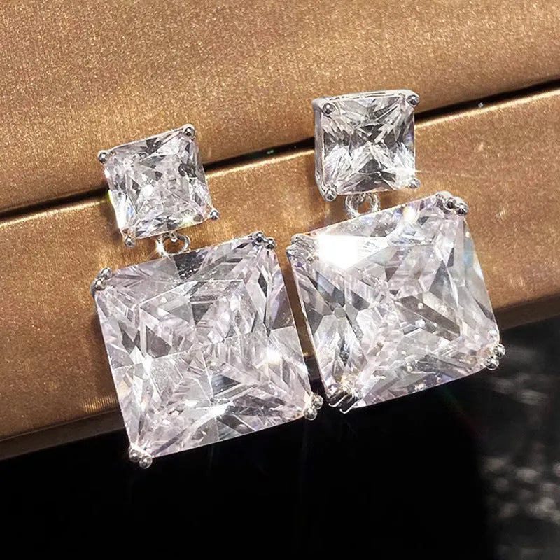 Geometric square copper earrings with quadrilateral ornament detail in white gold or gold tone finish