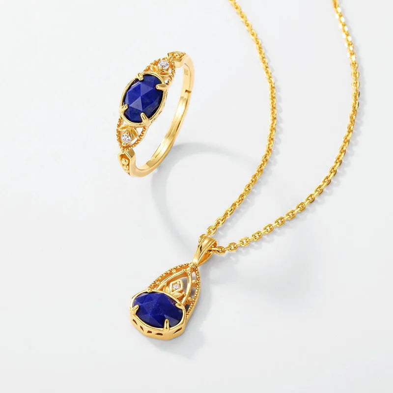 Japanese style geometric silver-tone alloy ring with a blue Lapis Lazuli ellipse stone.