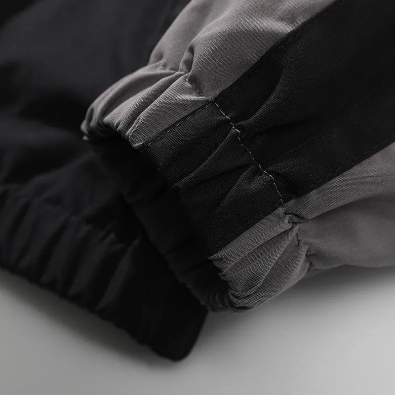 Men's black casual jacket with contrast stitching detail and side seam pockets
