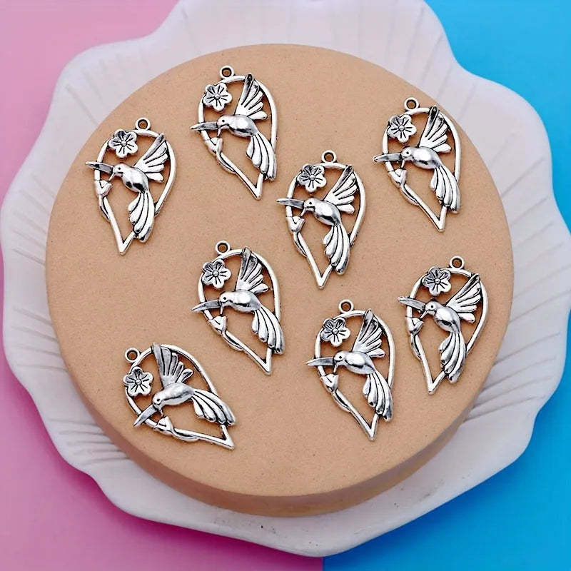 Alloy magpie bird pendant with electroplated finish in P234 colour for DIY jewellery making.