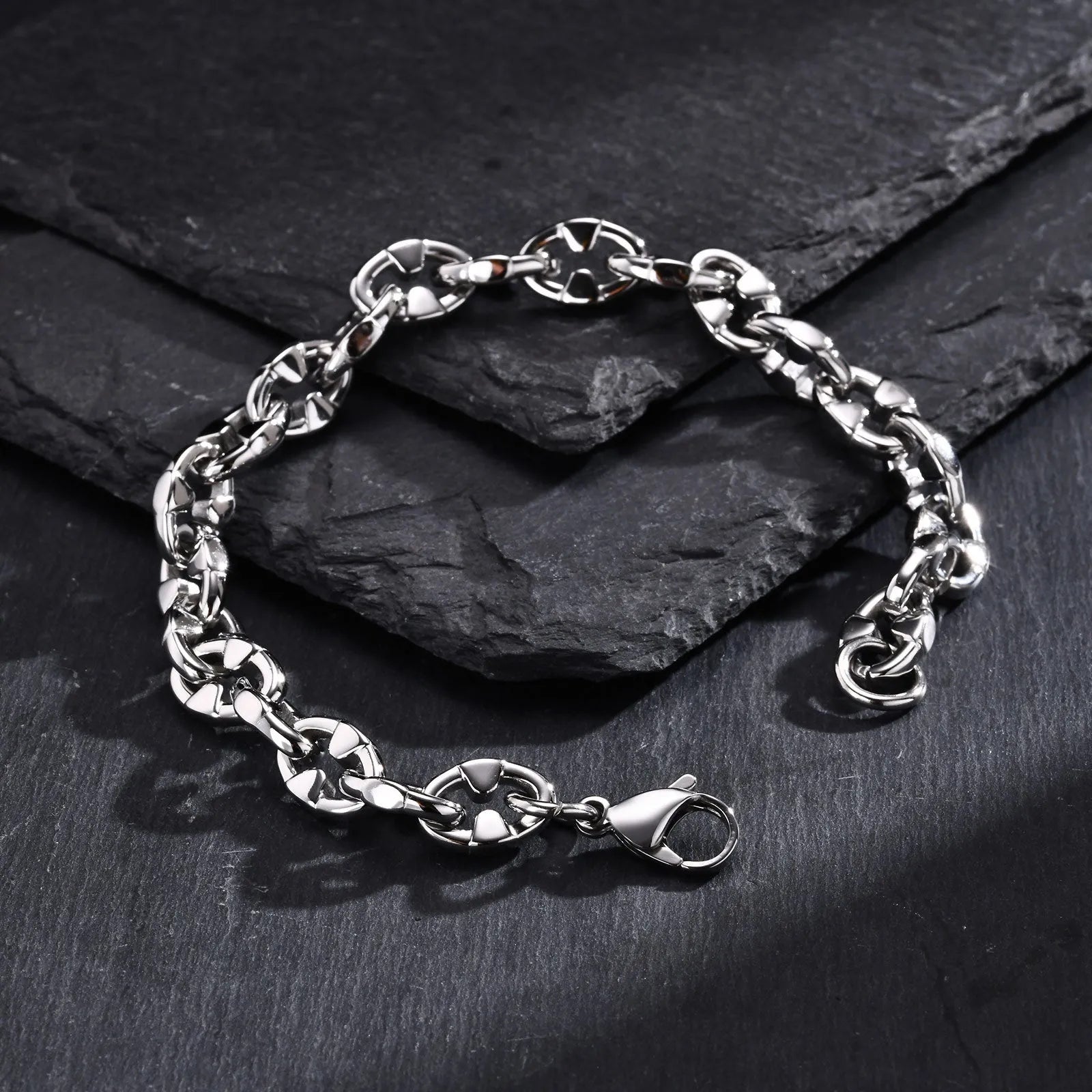 Handmade thick stainless steel geometric chain bracelet with a polished steel colour finish