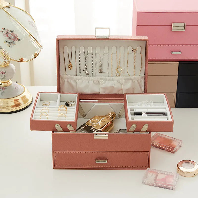 Hard leather jewellery storage box in beige, black, pink, or rose gold, showing its rectangular shape and compact size