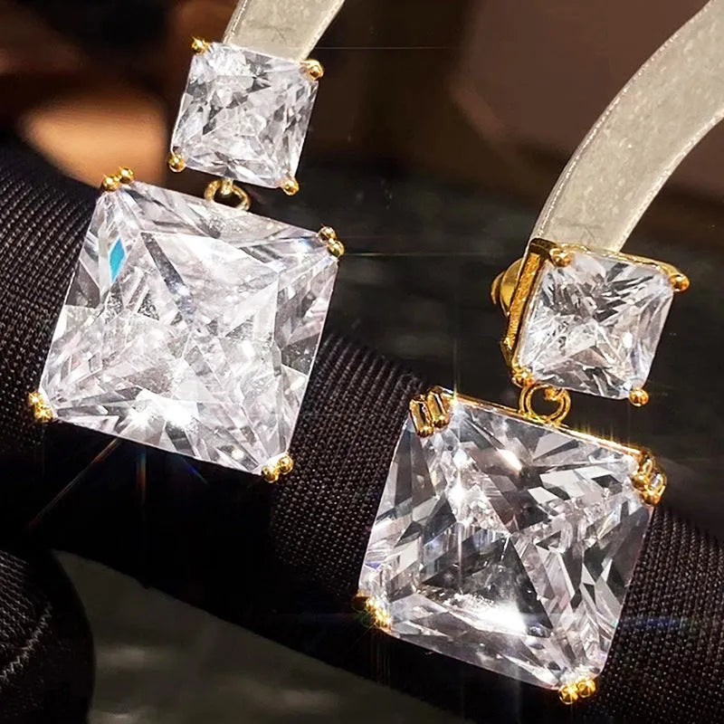 Geometric square copper earrings with quadrilateral ornament detail in white gold or gold tone finish