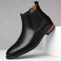 Men's black Chelsea boots with pointed toe and artificial PU leather upper on rubber sole
