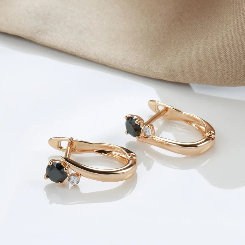Women's black agate drop earrings with gold-plated copper geometric settings