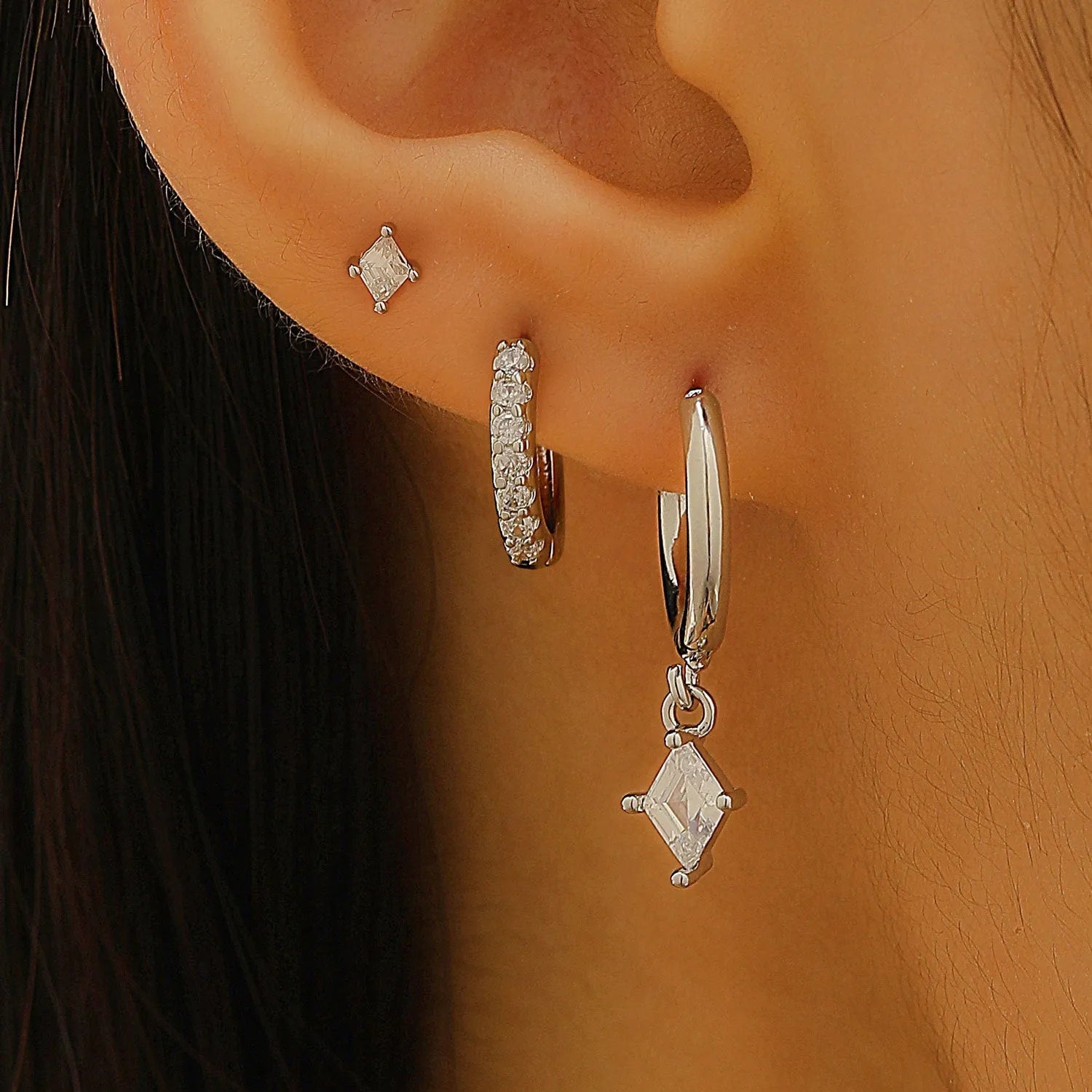 Ladies three-piece geometric earring set with zircon detailing in gold and white colours